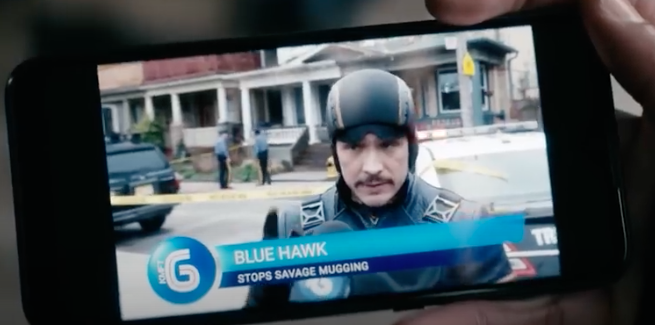 Phone displaying news clip of Blue Hawk