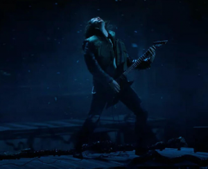 Eddie Munsen playing guitar